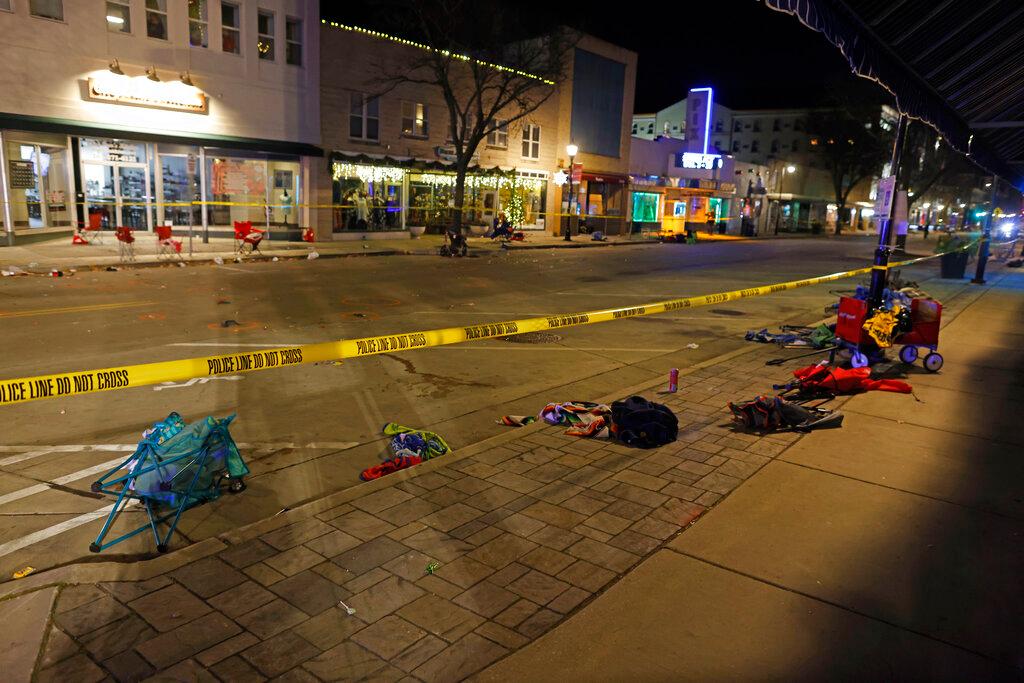 Police tape cordons off a street in Waukesha, Wisconsin, after a vehicle plowed into a Christmas parade hitting more than 20 people Sunday, Nov 21. Photo: AP