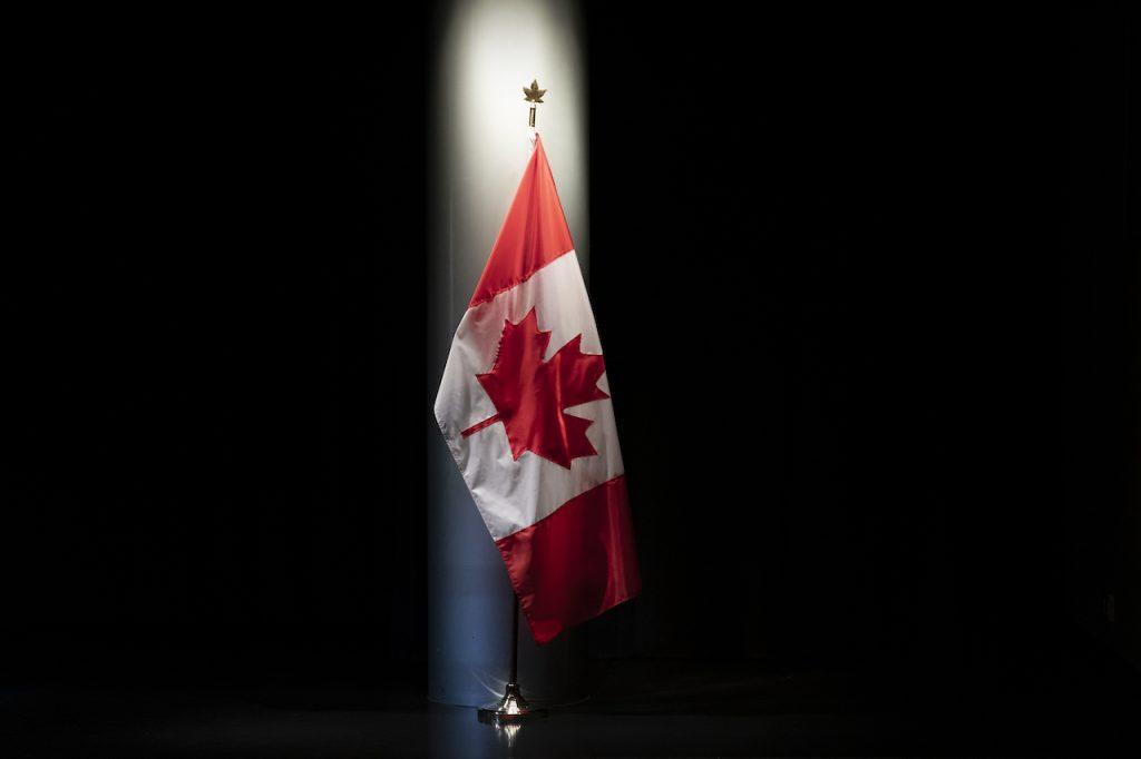 The Canadian flag is illuminated in the embassy of Canada in Washington, June 20, 2019. Canada turned at least 544 would-be refugees back to the US between March 2020 and mid-October. Photo: AP