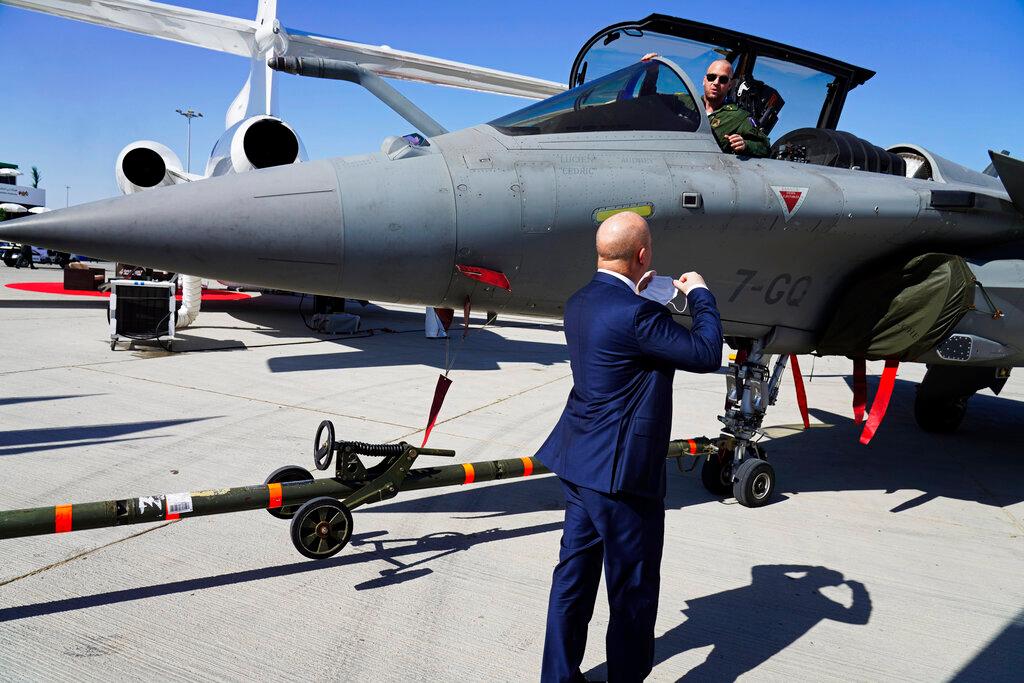 A French pilot sits in his Dassault Rafale fighter jet as it is pulled into position at the Dubai Air Show in Dubai, United Arab Emirates, Nov 14. France has been negotiating with Jakarta for several months the sale of 36 Rafale fighter jets. Photo: AP