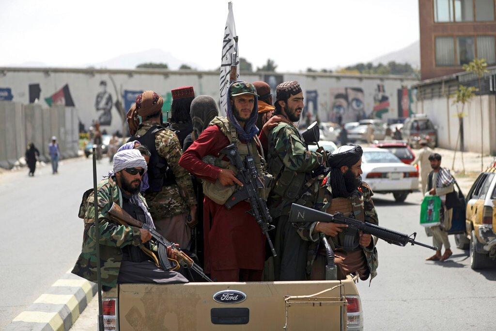 Taliban fighters patrol in Kabul, Afghanistan, in this photo taken Aug 19. The Taliban took over Afghanistan following the hasty withdrawal of the US military in August after the 20-year war in the country. Photo: AP