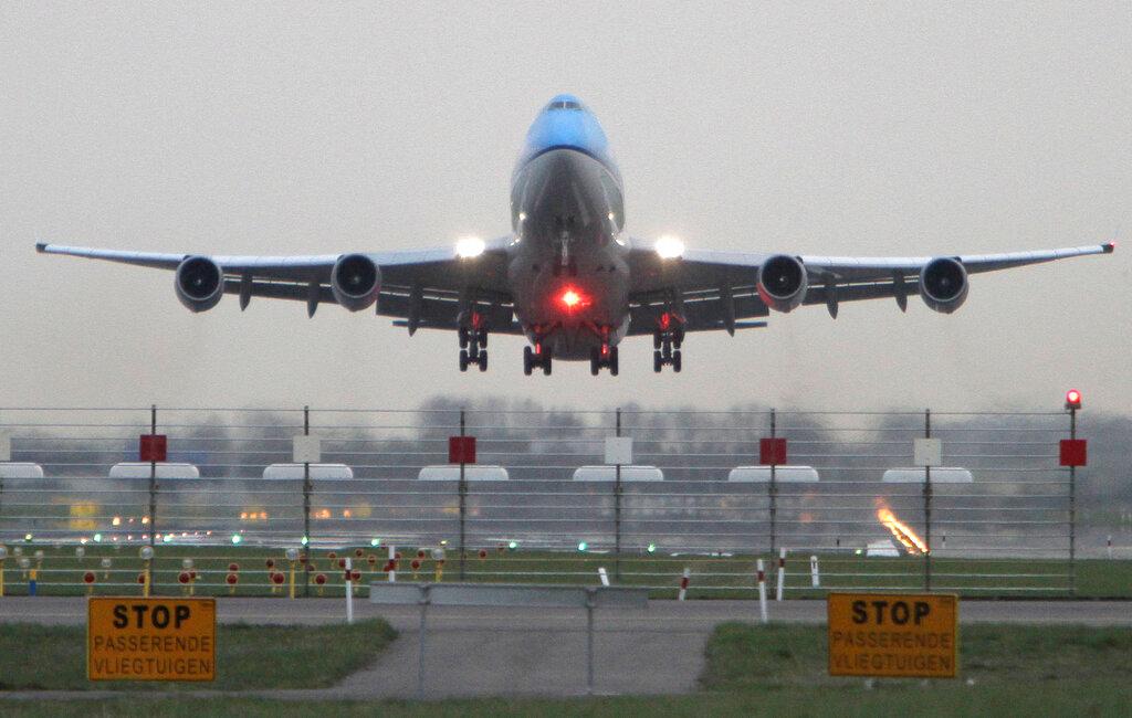 A KLM passenger plane takes off from Schiphol airport in Amsterdam, Netherlands, in this file photo. Dutch health authorities say 61 passengers aboard two flights from South Africa have tested positive for Covid-19 amid concern over the new Omicron variant. Photo: AP