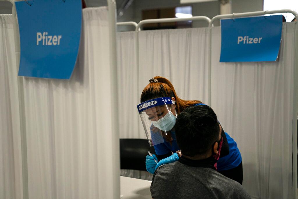 A nurse administers a dose of Pfizer vaccine at a vaccination centre in California in this May 21 file photo. Photo: AP