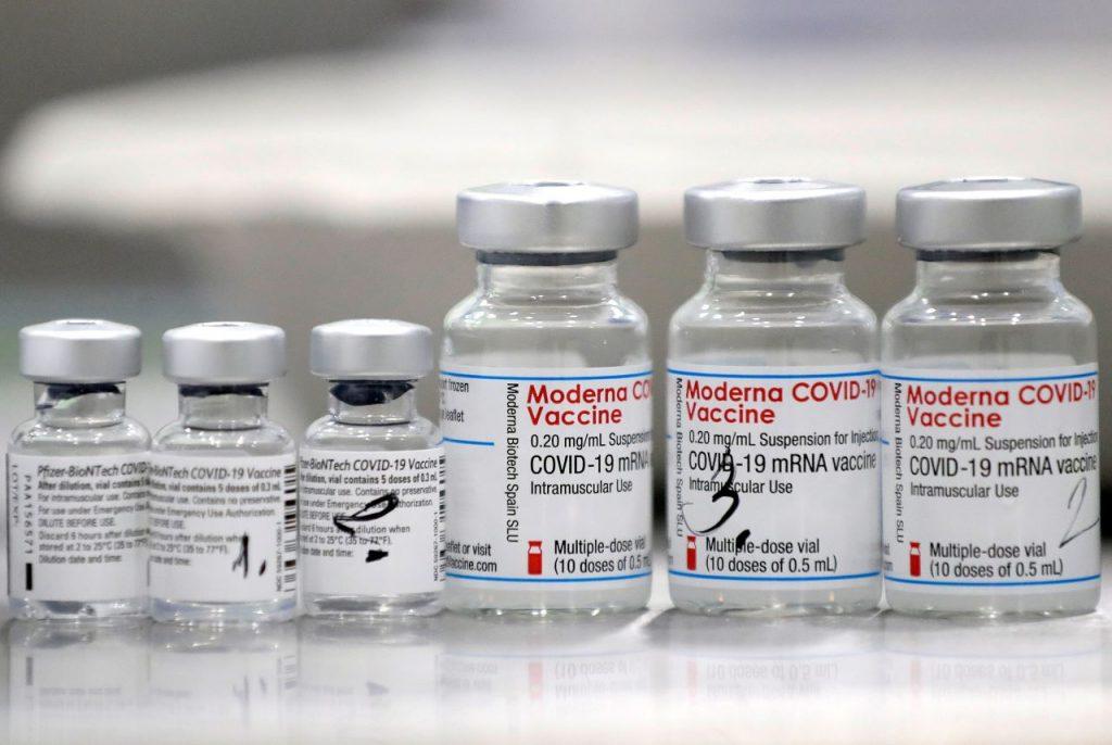 Vials of Covid-19 vaccines of Pfizer-BioNTech and Moderna are seen in the town of Ricany near Prague, Czech Republic, Feb 25. Photo: Reuters