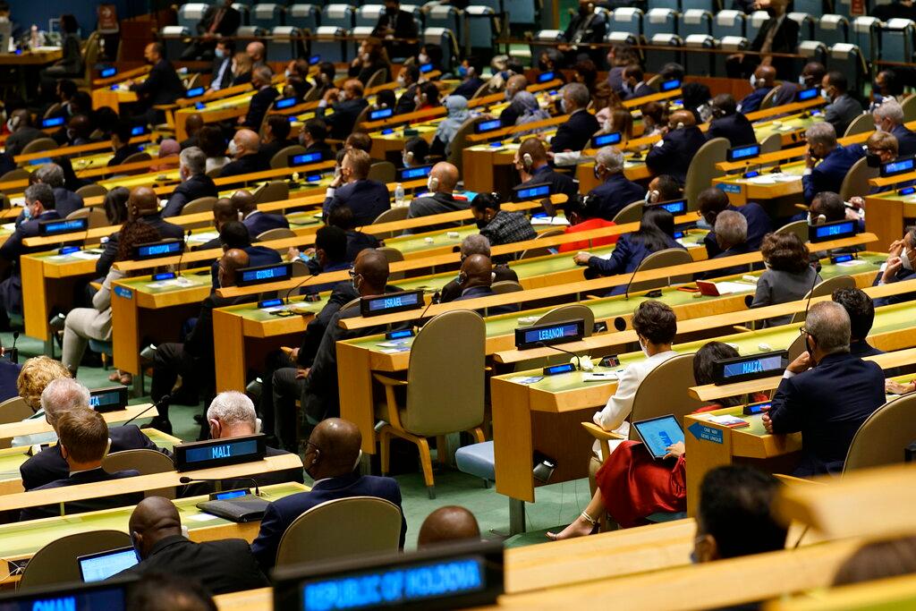 Delegates listen as US President Joe Biden speaks at the 76th Session of the UN General Assembly, Sept 21, at the United Nations headquarters in New York. The latest deferral keeps in place envoys appointed to the UN by former governments in both Myanmar and Afghanistan before they were toppled. Photo: AP