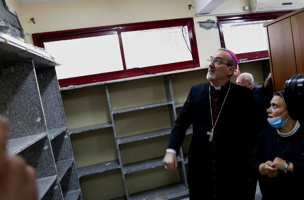 Latin Patriarch of Jerusalem Pierbattista Pizzaballa inspects damage at the Rosary Sisters School during his visit to Gaza City, June 14. The school was damaged last month during an 11-day war between Israel and the Hamas militant group that rules Gaza. Photo: AP