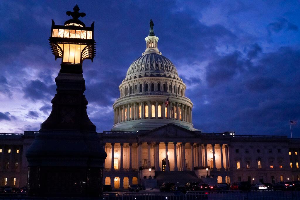 Night falls at the the Capitol in Washington, Dec 2. Photo: AP