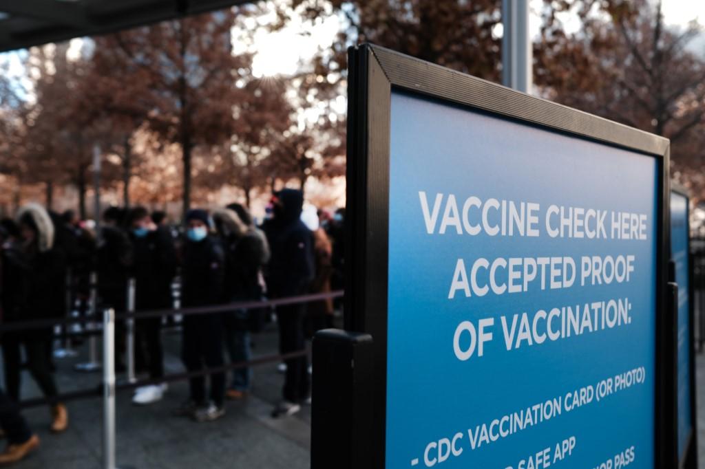 A sign asks for proof of vaccination in Manhattan at the entrance to a museum on Nov 29 in New York City. Photo: AFP
