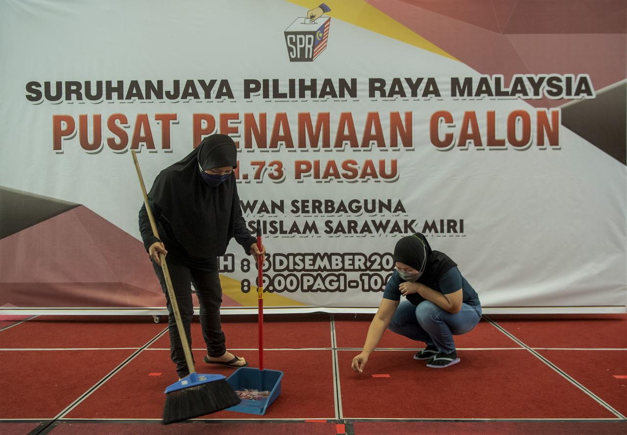 Election workers make final preparations at a centre in Sarawak ahead of nomination day on Dec 6. Photo: Bernama