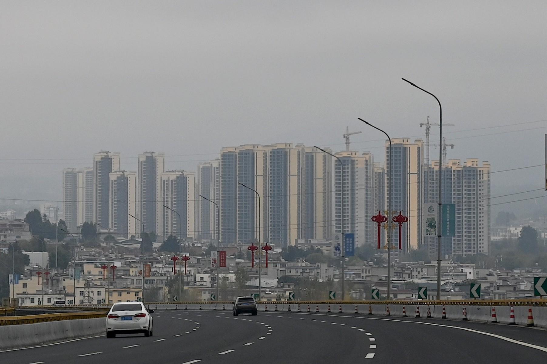 Residential buildings under construction are seen in Kunming, in southwestern Yunnan province on Oct 23. China's real estate industry – a key growth driver in the world's second-largest economy – has cooled in recent months after Beijing tightened home buying rules and launched a regulatory assault on speculation. Photo: AFP