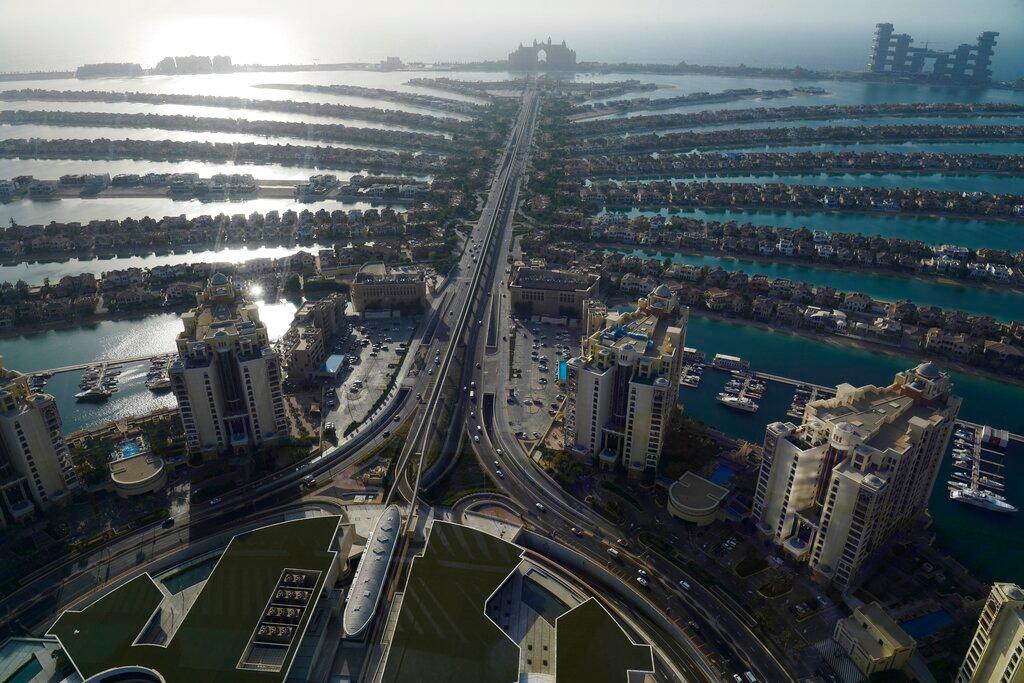 The fronds of the manmade Palm Jumeirah archipelago stretch out across the Persian Gulf in Dubai, United Arab Emirates, July 19. Photo: AP