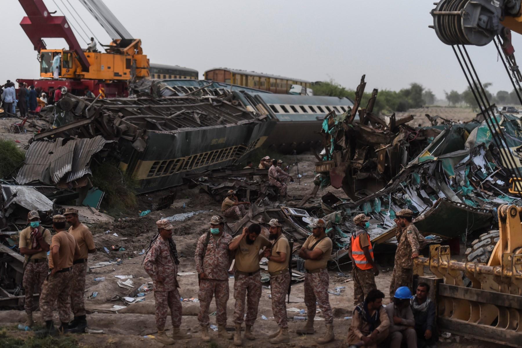 Security personnel gather at the site of a train accident in Daharki area of the northern Sindh province on June 7. Photo: AFP