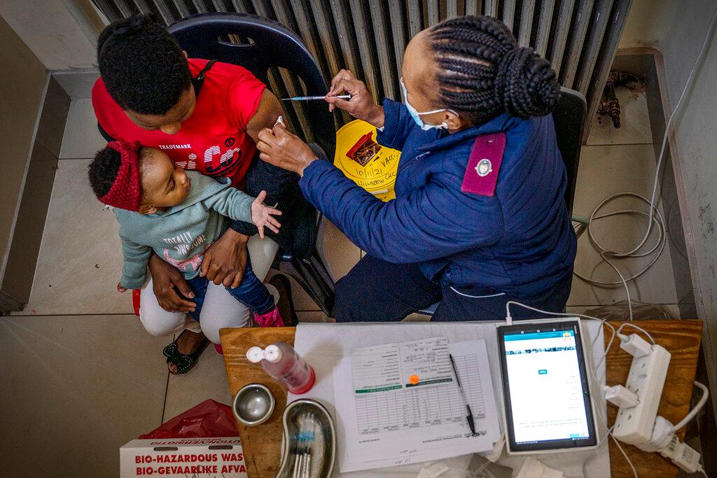 A woman is vaccinated against Covid-19 at the Hillbrow Clinic in Johannesburg, South Africa, Dec 6. Photo: AP