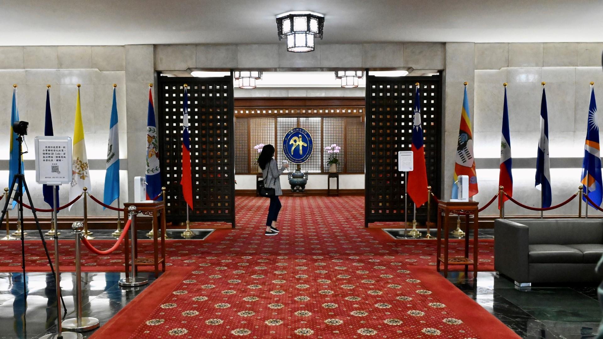 Flags of nations that recognise Taiwan are seen at the Ministry of Foreign Affairs building in Taipei on Dec 10, after Nicaragua switched diplomatic allegiance from Taiwan to China. Photo: AFP
