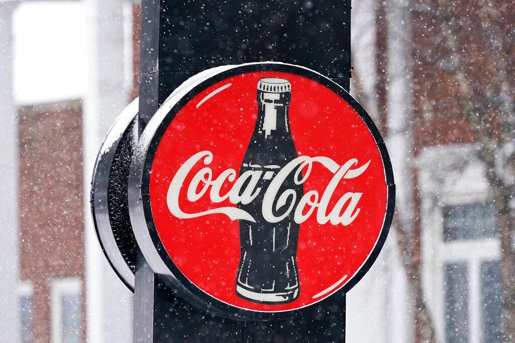 A Coca-Cola sign hangs outside a Coca-Cola distributor in Bedford, Ohio, Feb 9. Photo: AP