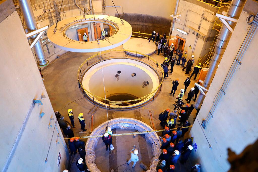 In this photo released by the Atomic Energy Organization of Iran, technicians work at the Arak heavy water reactor's secondary circuit, as officials and media visit the site, near Arak, 250km southwest of the capital Tehran, Iran, Dec 23, 2019. Photo: AP