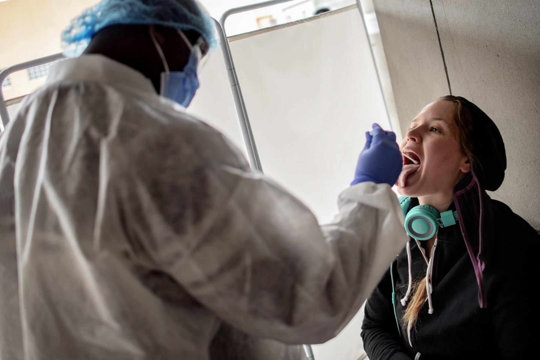 A nurse from Lancet Nectare hospital performs a Covid-19 coronavirus test in Richmond, Johannesburg, on Dec 18, 2020. Photo: AFP