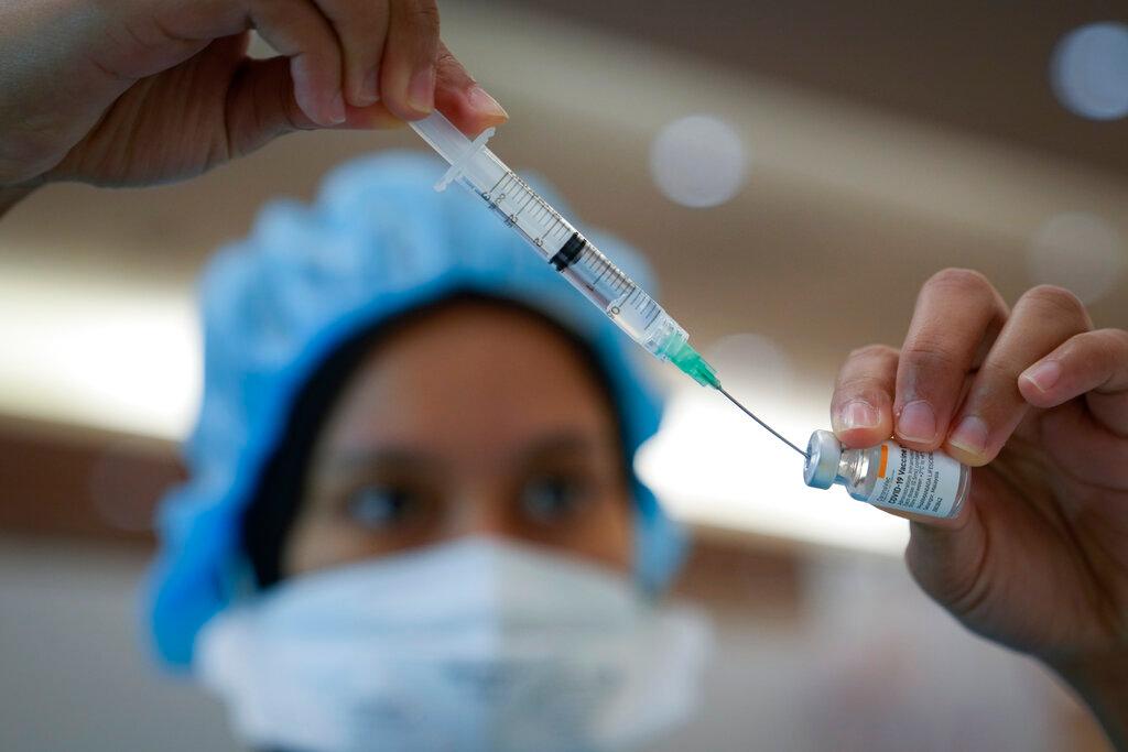 A health worker prepares to administer a dose of the Sinovac Covid-19 vaccine at a vaccination centre at Sunway Medical centre in Sunway, in this June 4 file picture. Photo: AP