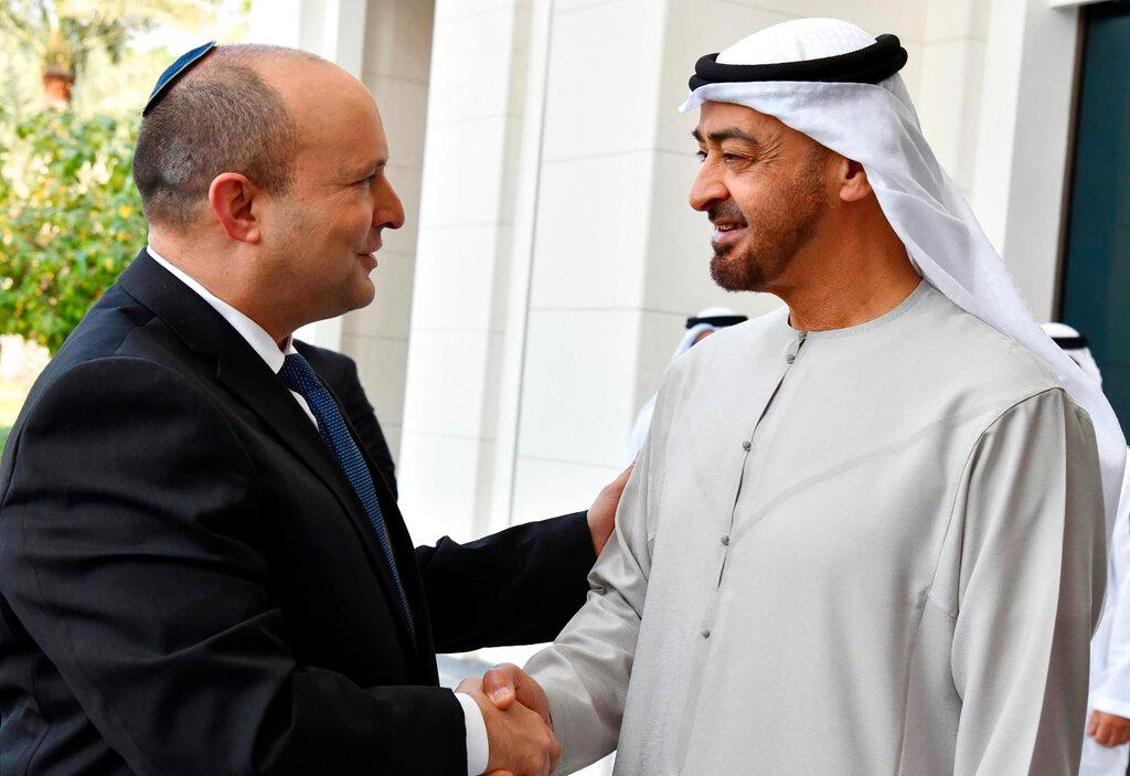 Israeli Prime Minister Naftali Bennett, shakes hands with Sheikh Mohammed bin Zayed Al Nahyan, the crown prince of Abu Dhabi and de facto ruler of the United Arab Emirates, in Abu Dhabi, United Arab Emirates, Dec 13. Photo: AP