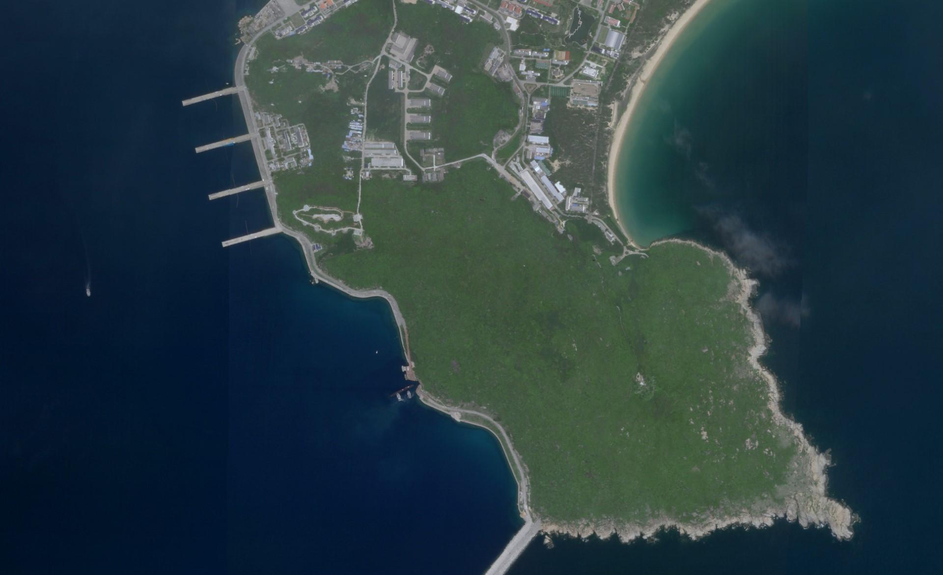 This August 18, 2020, image courtesy of Planet Labs, Inc, reportedly show a Chinese submarine entering an underground base on Hainan Island. China claims almost the entire South China Sea as its own and has built military outposts on artificial islands in the waters that contain gas fields and rich fishing. Photo: AFP