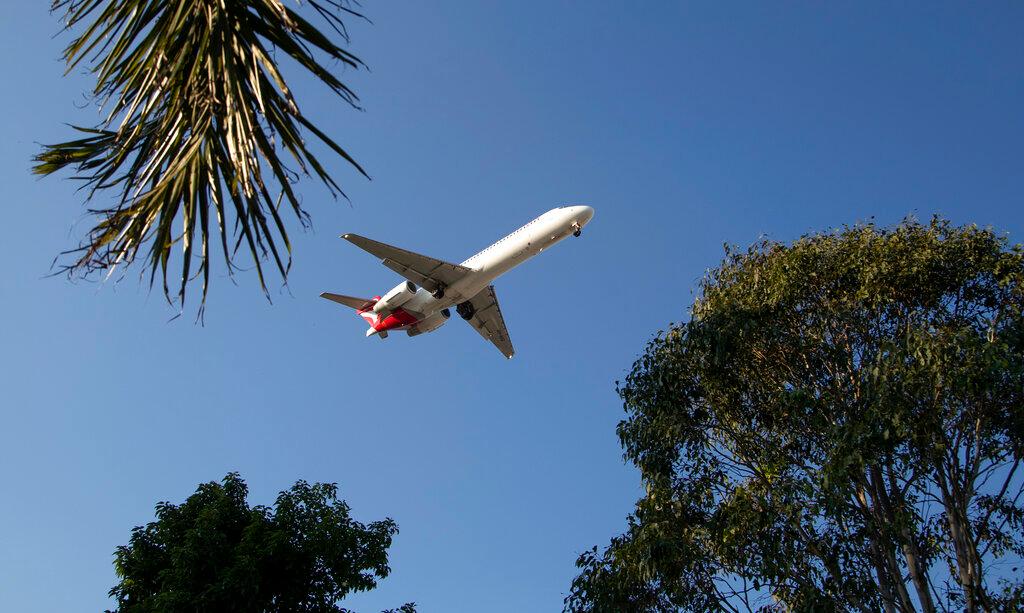A passenger jet makes its final approach for landing into Sydney Airport, April 26. Photo: AP