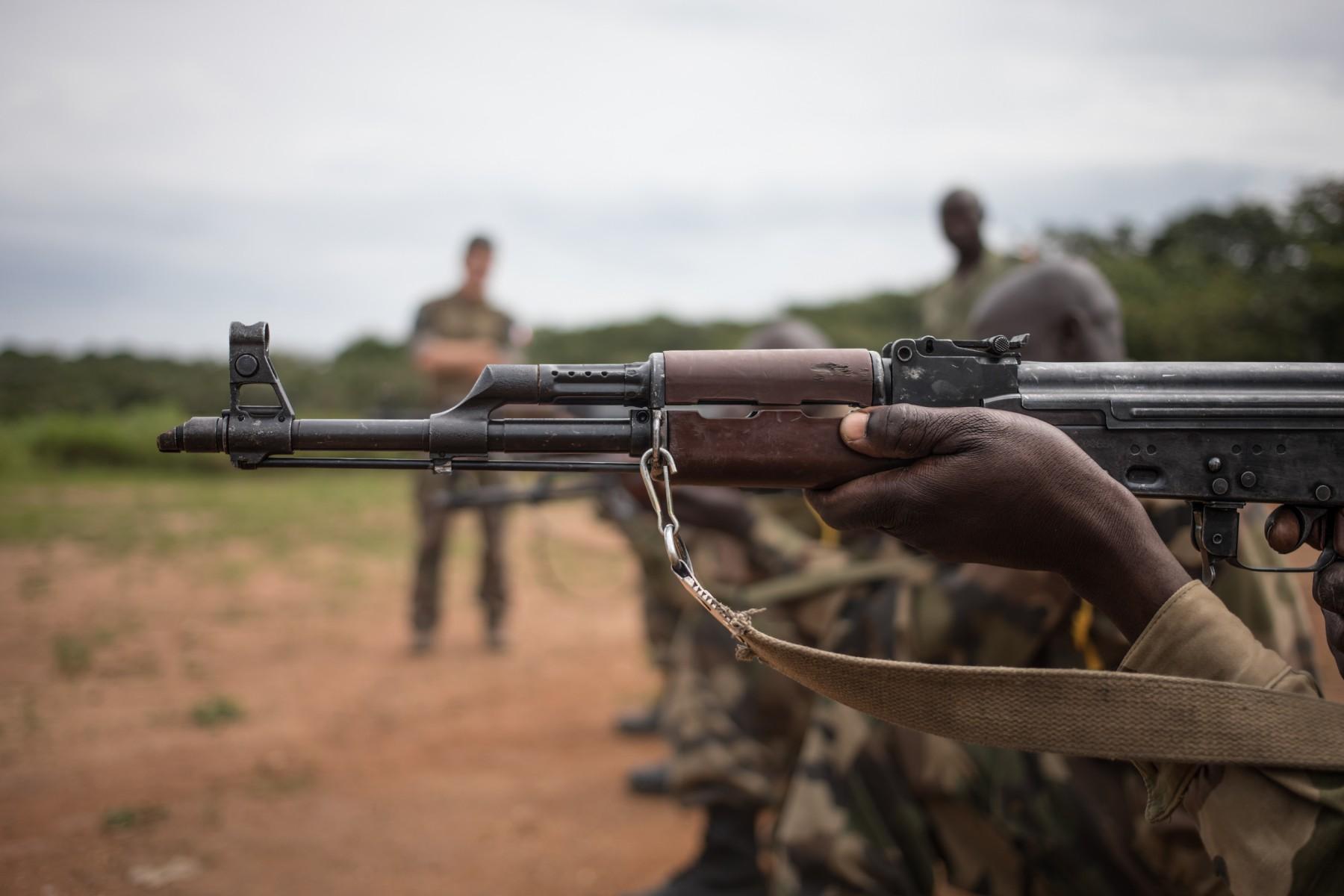 A Central African armed forces recruit aims an AK-47s assault rifle during a shooting session at the Camp Leclerc base in Bouar, northwest from the capital Bangui, on Aug 05, 2019. The European Union Training Mission trains the Central African Armed Forces at the rehabilitated Leclrec camp, a former French base that was handed over to the Central African State in 1997. Photo: AFP