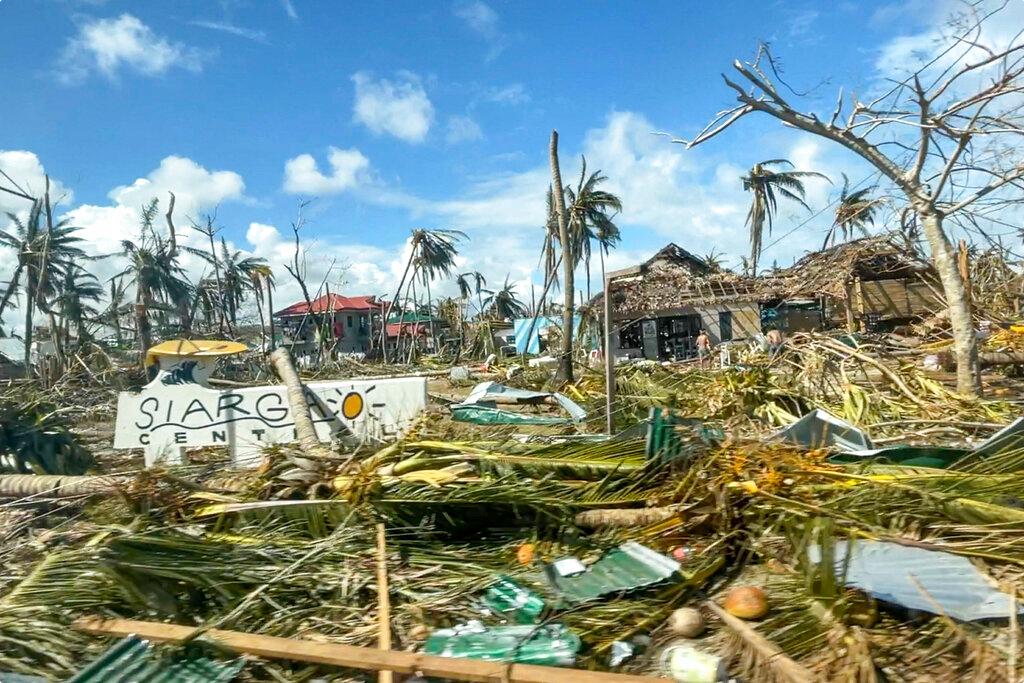 In this handout photo provided by the Office of the Vice-President, toppled trees and structures are scattered due to Typhoon Rai in Siargao island, Surigao del Norte, southern Philippines on Dec 19. Photo: AP