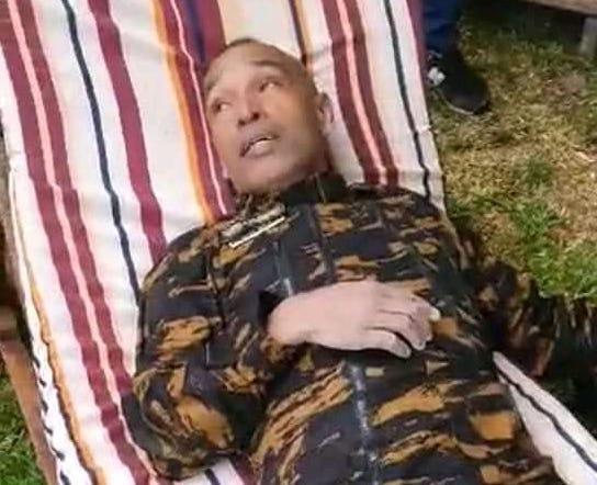 A video screenshot showing Serge Gelle after swimming to shore following a helicopter crash.