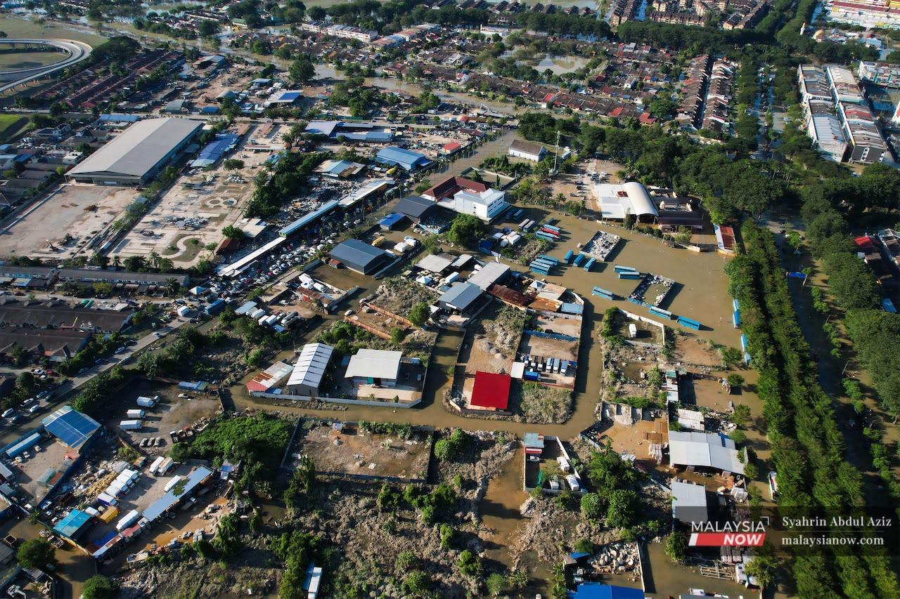 An aerial view of the floodwater covering Taman Sri Muda in Shah Alam.