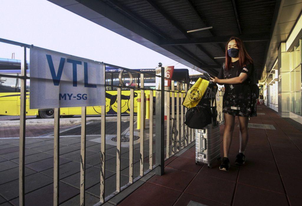 Under the vaccinated travel lane programme, Malaysia and Singapore allowed quarantine-free entry for fully vaccinated travellers, who would have to do multiple screenings. Photo: Bernama