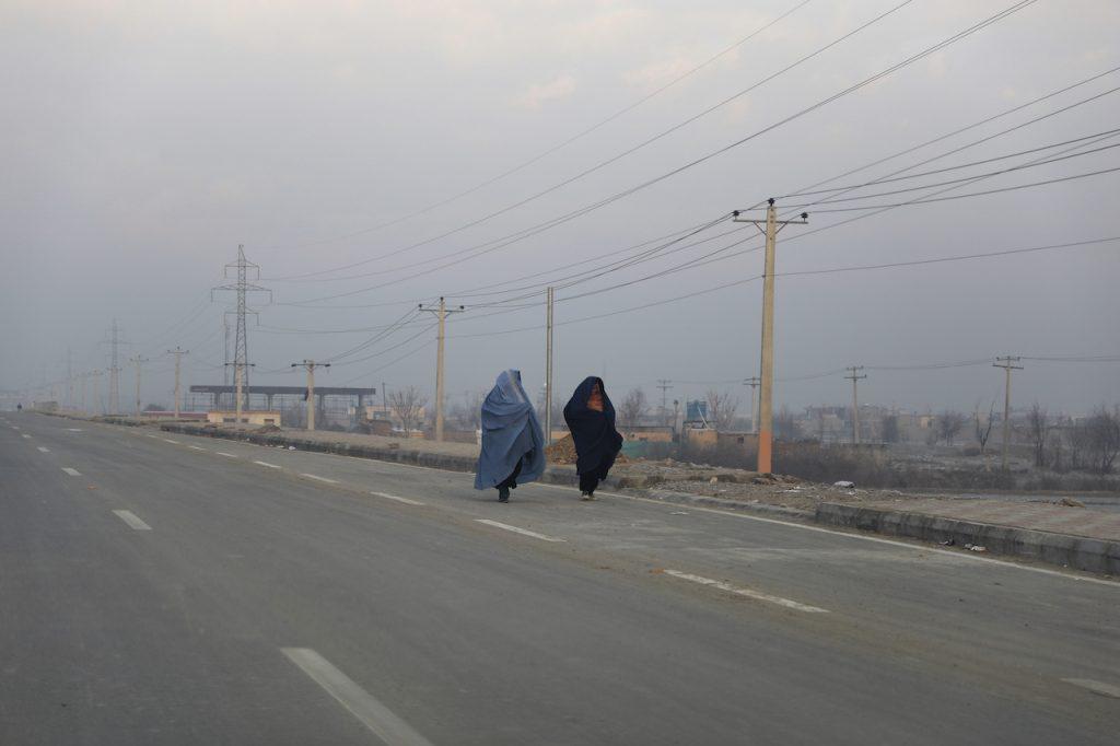 Afghan women walk on a road in Kabul, Jan 7. Photo: AP