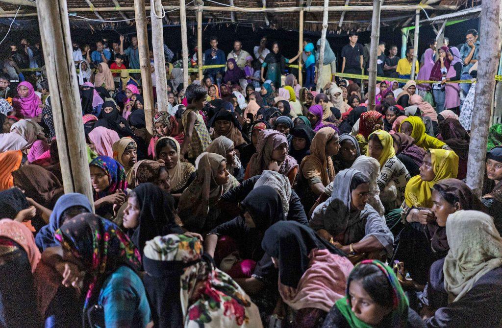 Ethnic Rohingya people rest after the boat carrying them landed in Lhokseumawe, Aceh province in Indonesia, in this Sept 7, 2020 file photo. Hundreds of Rohingya refugees have reached Aceh at intervals over the past few years, all of whom had been at sea for months. Photo: AP