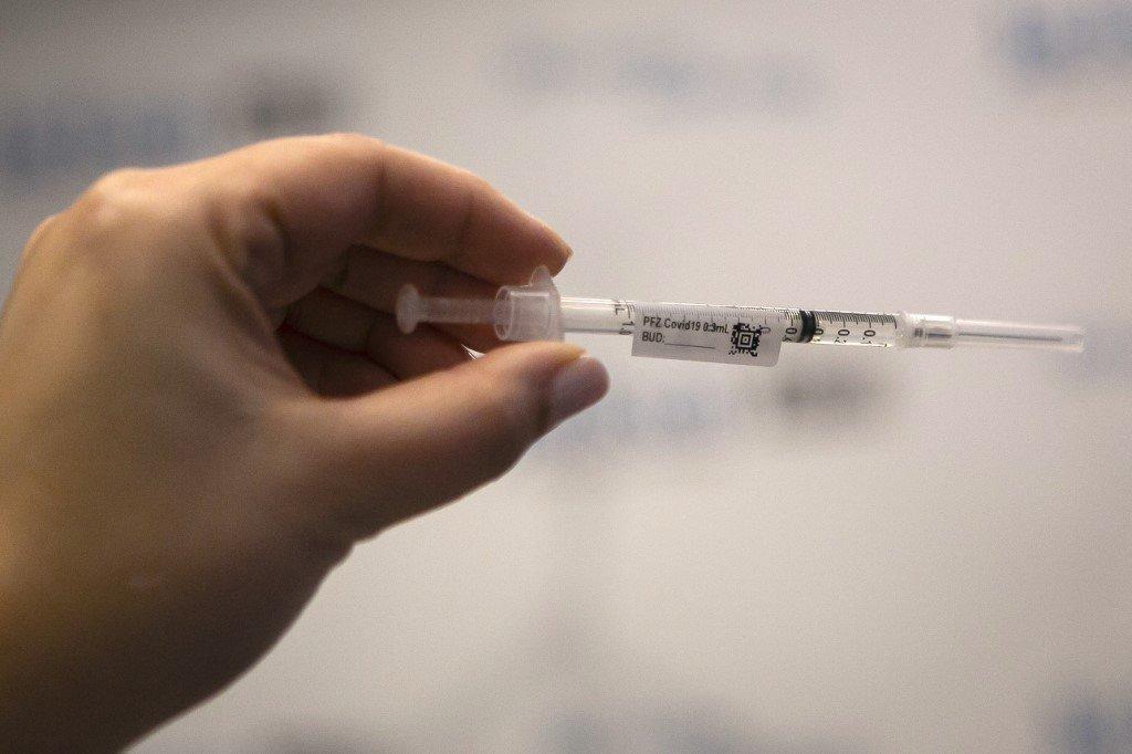 More than four million people from Israel's population of 9.4 million have received three shots of coronavirus vaccine. Photo: AFP