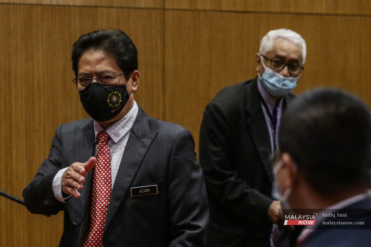Malaysian Anti-Corruption Commission chief Azam Baki arrives for a press conference in Putrajaya yesterday.