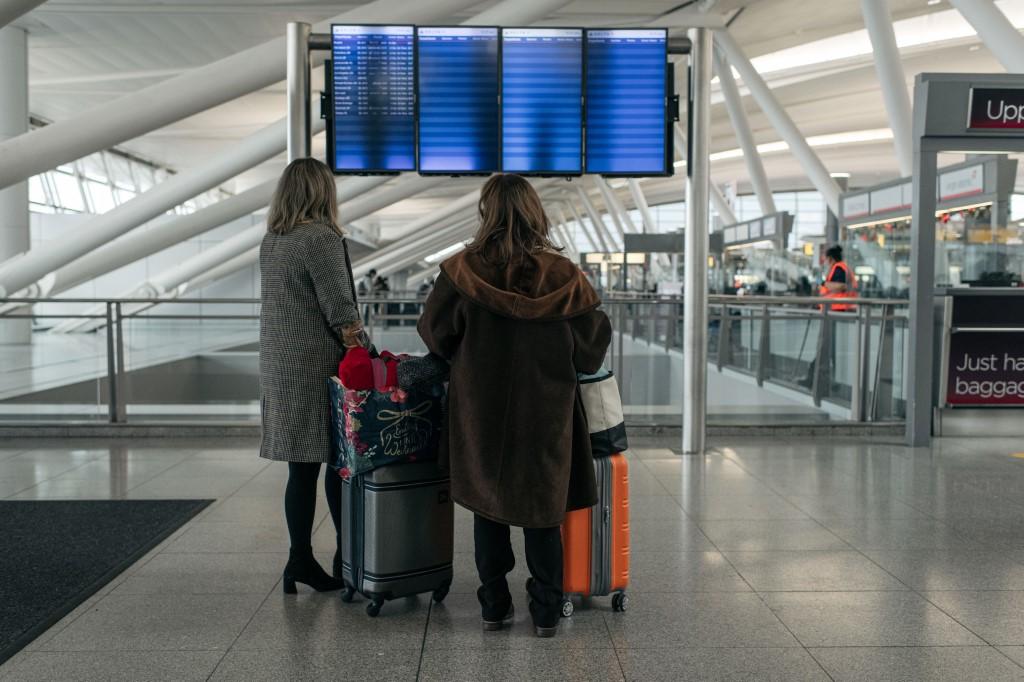 Travellers move through the departures hall at Terminal 4 of John F Kennedy International Airport on Dec 24, 2021 in New York City. Photo: AFP