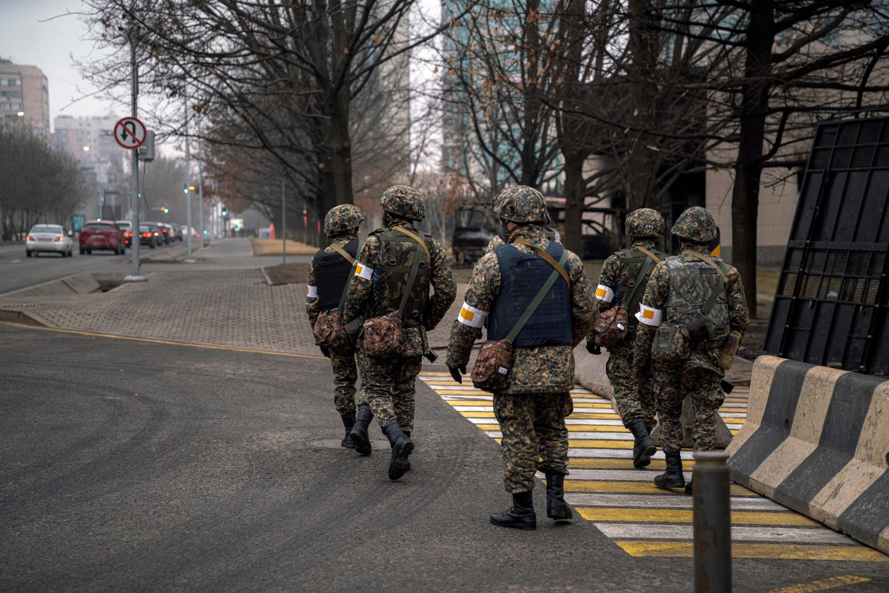 Kazakh soldiers patrol down a street in Almaty on Jan 10. Photo: AFP
