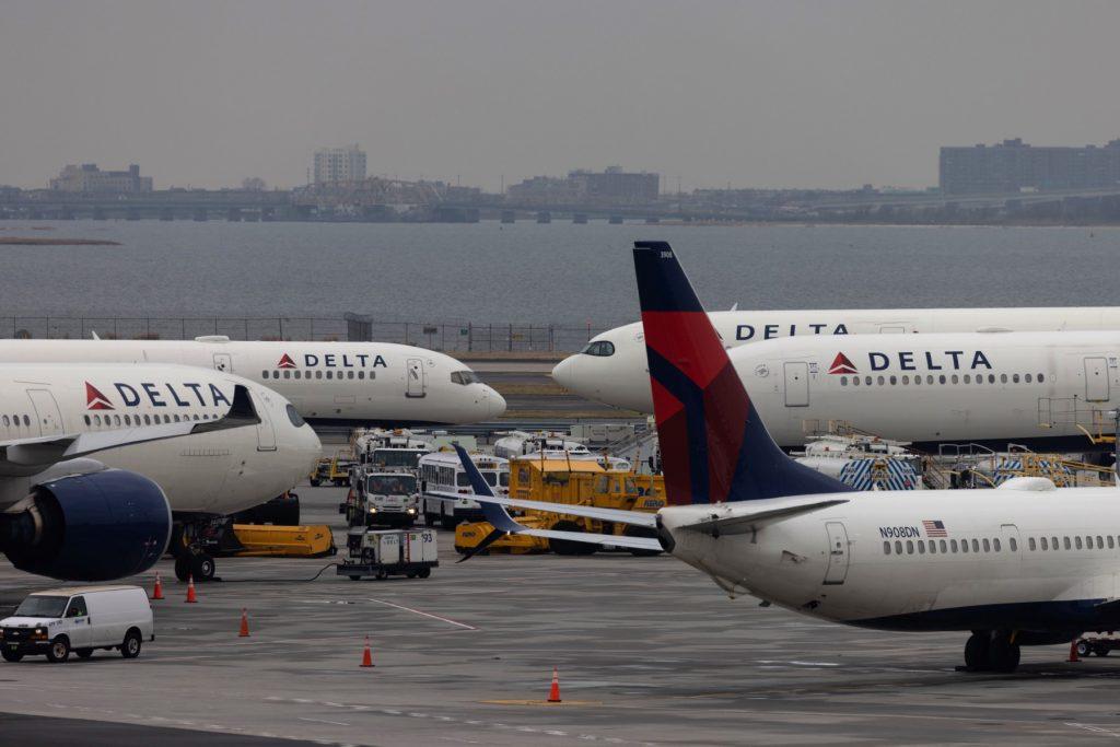 Delta Airlines passenger aircrafts are seen on the tarmac of John F Kennedy International Airport in New York, on Dec 24, 2021. Photo: AFP