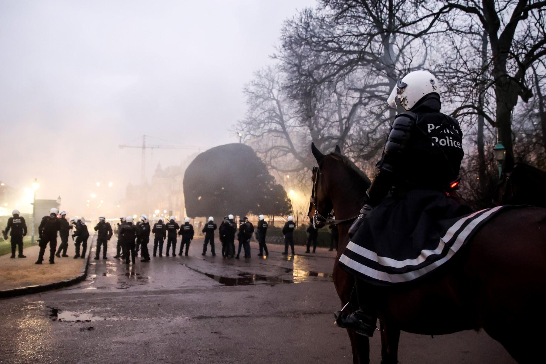 A mounted police officers looks on on his horse during a demonstration against Covid-19 vaccination in Brussels, on Dec 19, 2021. Photo: AFP