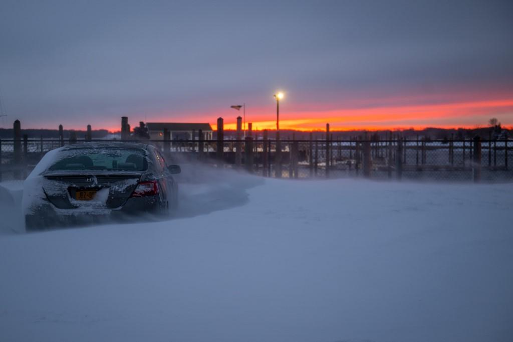 The sun sets following a major snowstorm on Jan 29 in Stony Brook, New York. A powerful nor’easter brought blinding blizzard conditions with high winds causing widespread power outages to much of the Mid-Atlantic and New England coast. Photo: AFP