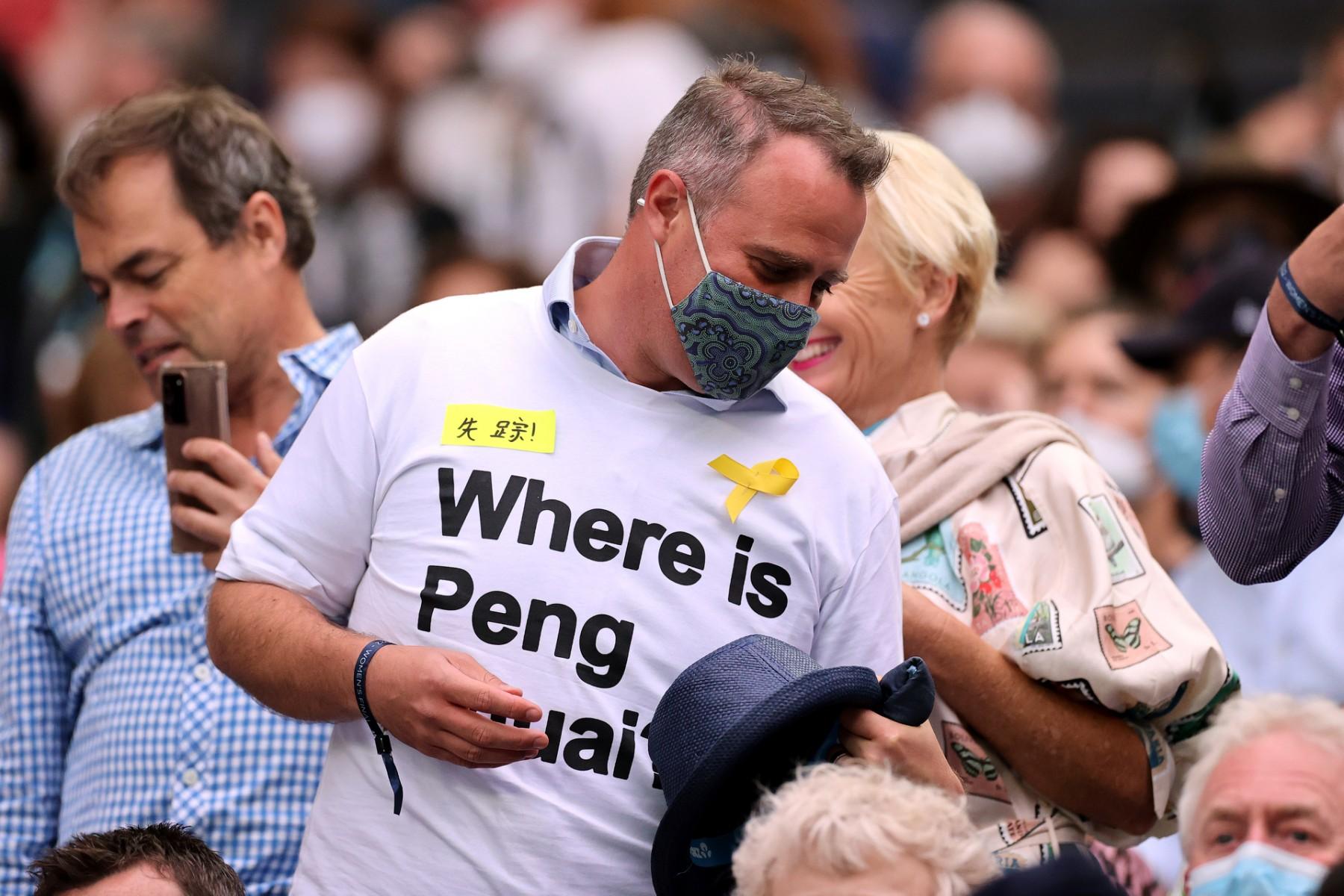 A spectator wearing a 'Where is Peng Shuai?' T-shirt is pictured in the stands on day thirteen of the Australian Open tennis tournament in Melbourne on Jan 29. Photo: AFP