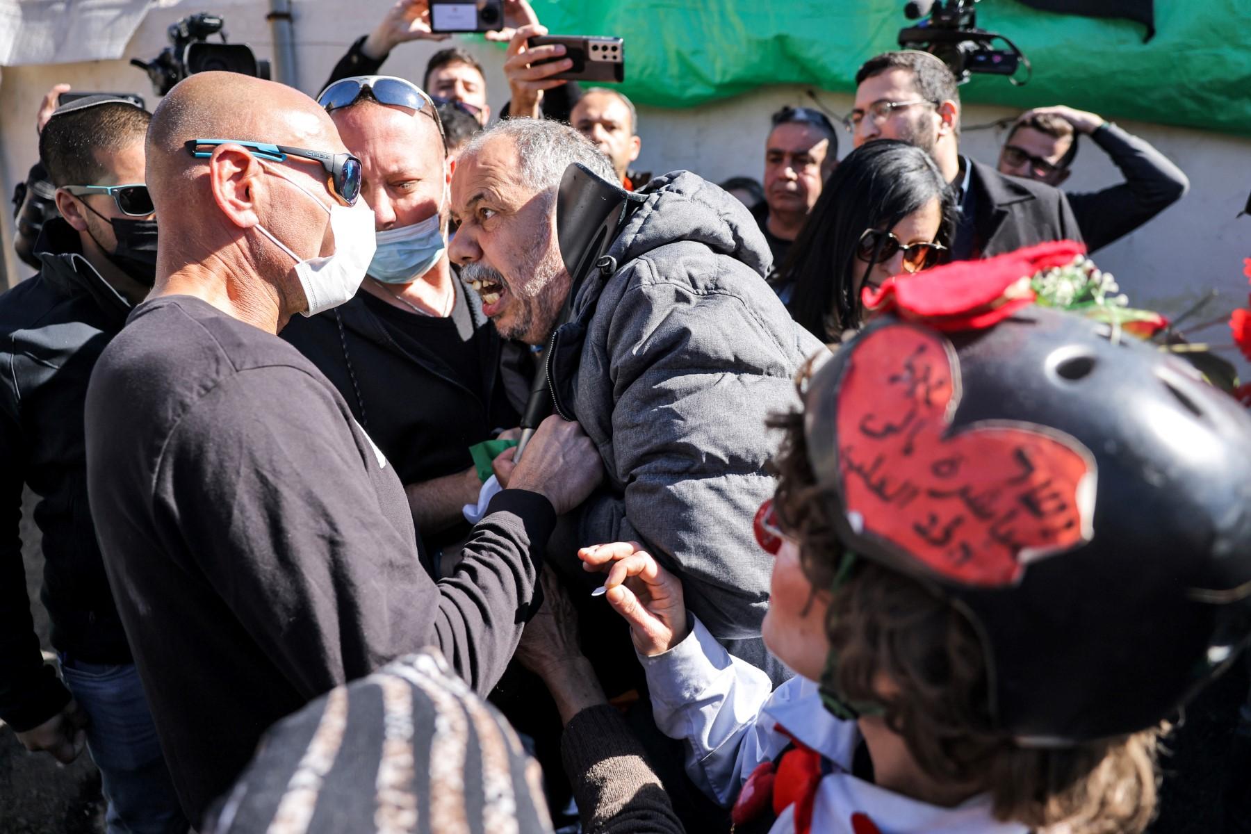 A Palestinian man (centre) confronts a plainclothes Israeli policeman (left) in the east Jerusalem neighbourhood of Sheikh Jarrah on Feb 13. Photo: AFP