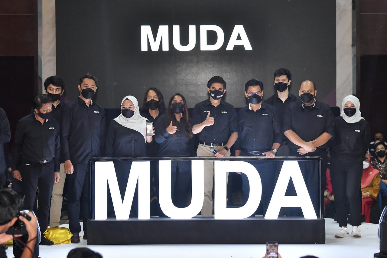 Muda president Syed Saddiq Syed Abdul Rahman (fifth right) gives a thumbs up sign alongside other members of the Supreme Council at the party's launching ceremony in Kuala Lumpur on Feb 11. Photo: Bernama