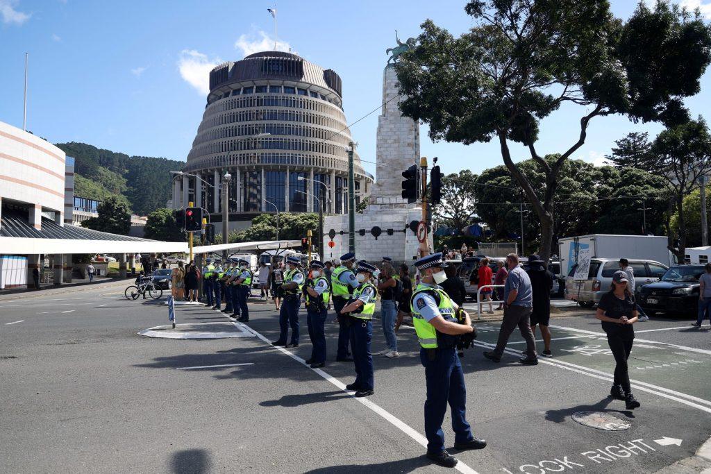 Police take over an intersection leading to Parliament on the ninth day of demonstrations against Covid-19 restrictions in Wellington on Feb 16, inspired by a similar demonstration in Canada. Photo: AFP