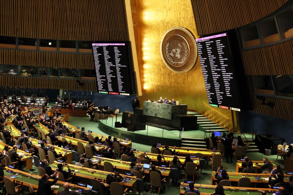Members of the General Assembly vote on a resolution during a special session of the General Assembly at the United Nations headquarters on March 2, in New York City. Photo: AFP