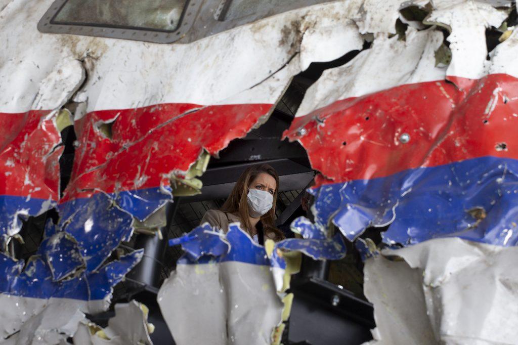 Trial judges and lawyers are seen inside the cockpit as they view the reconstructed wreckage of Malaysia Airlines flight MH17 at the Gilze-Rijen Airbase, southern Netherlands on May 26, 2021. Photo: AFP
