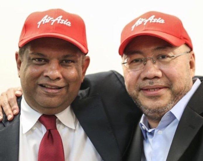 Pengasas AirAsia Tony Fernandes dan Kamarudin Meranun.