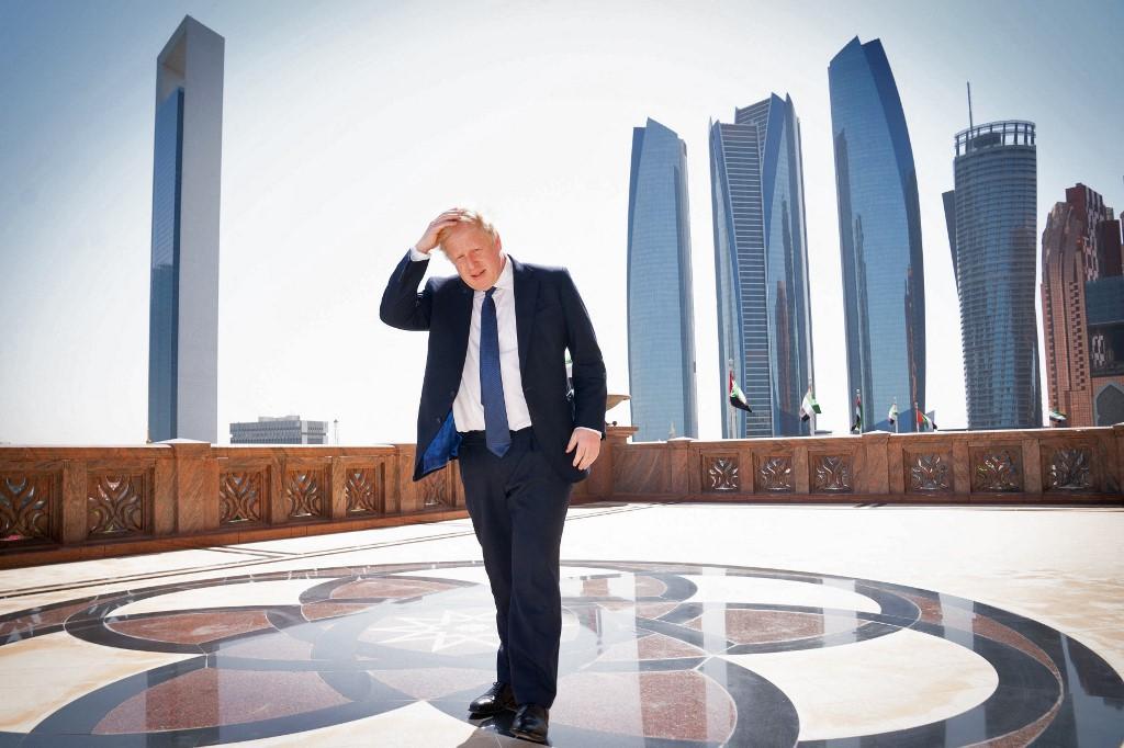 British Prime Minister Boris Johnson arrives for a media interview at the Emirates Palace hotel in Abu Dhabi during his visit to the United Arab Emirates on March 16. Photo: AFP