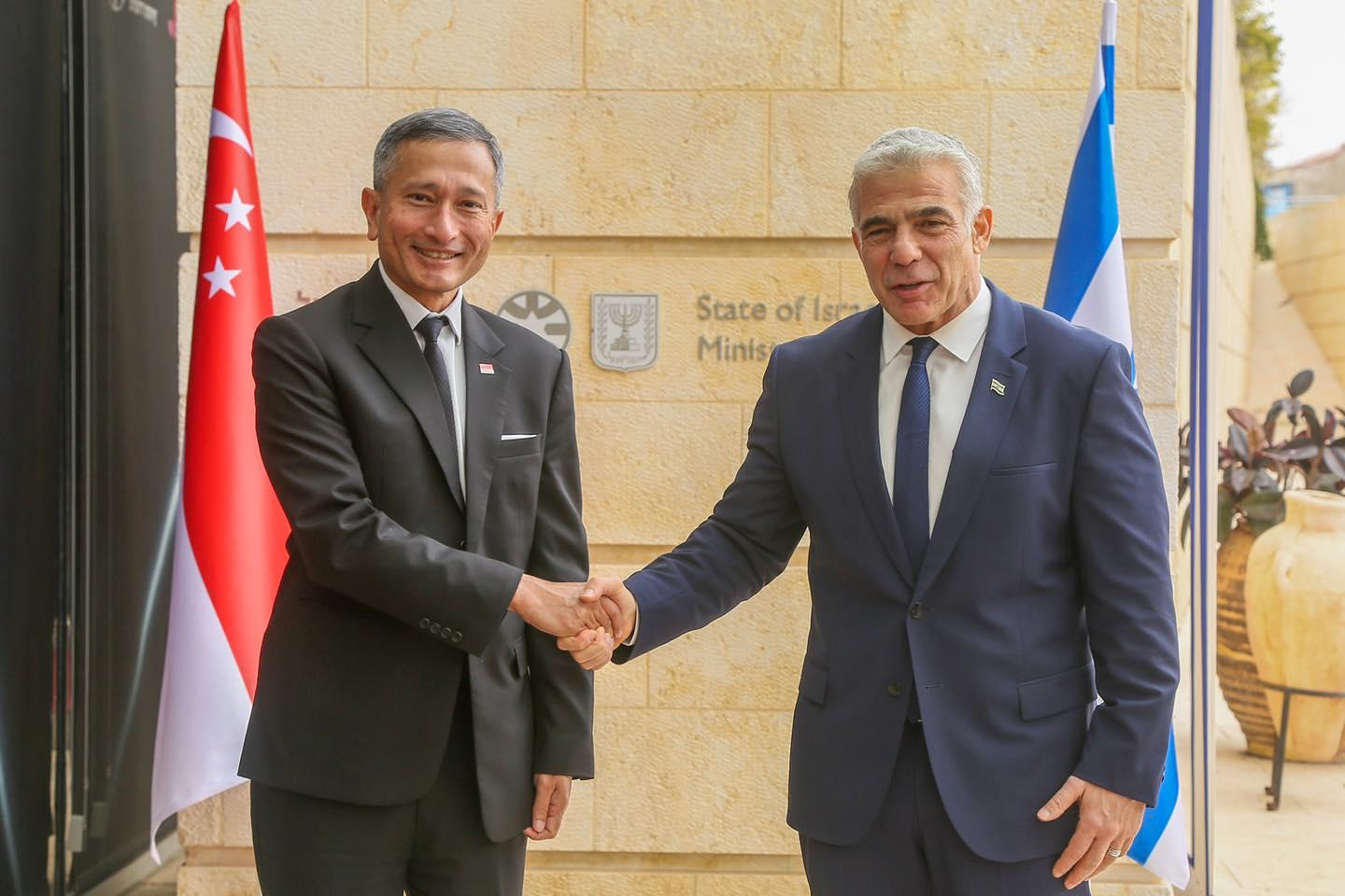 Singapore's Foreign Minister Vivian Balakrishnan shakes hands with his Israel counterpart Yair Lapid in this picture taken in the city-state yesterday. Photo: Facebook