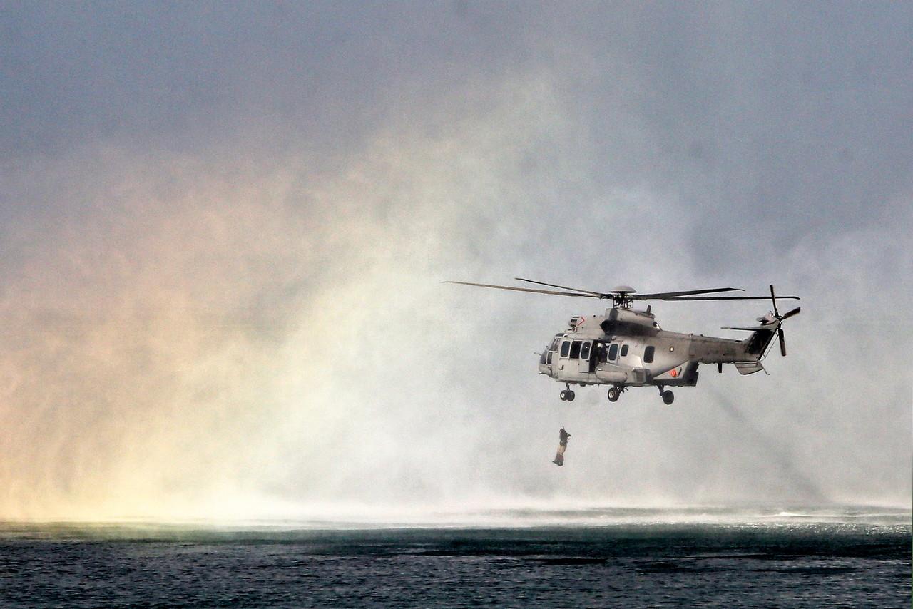 Army personnel carry out a demonstration using a Eurocopter EC 725 helicopter belonging to the Royal Malaysian Air Force in conjunction with the celebration of the 89th Malaysian Army Day at Segenting Camp in Port Dickson on March 1. Photo: Bernama