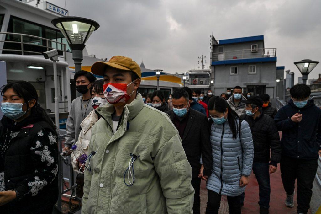 People arrive at a ferry station after crossing the Huangpu River in Shanghai on Feb 16. Photo: AFP
