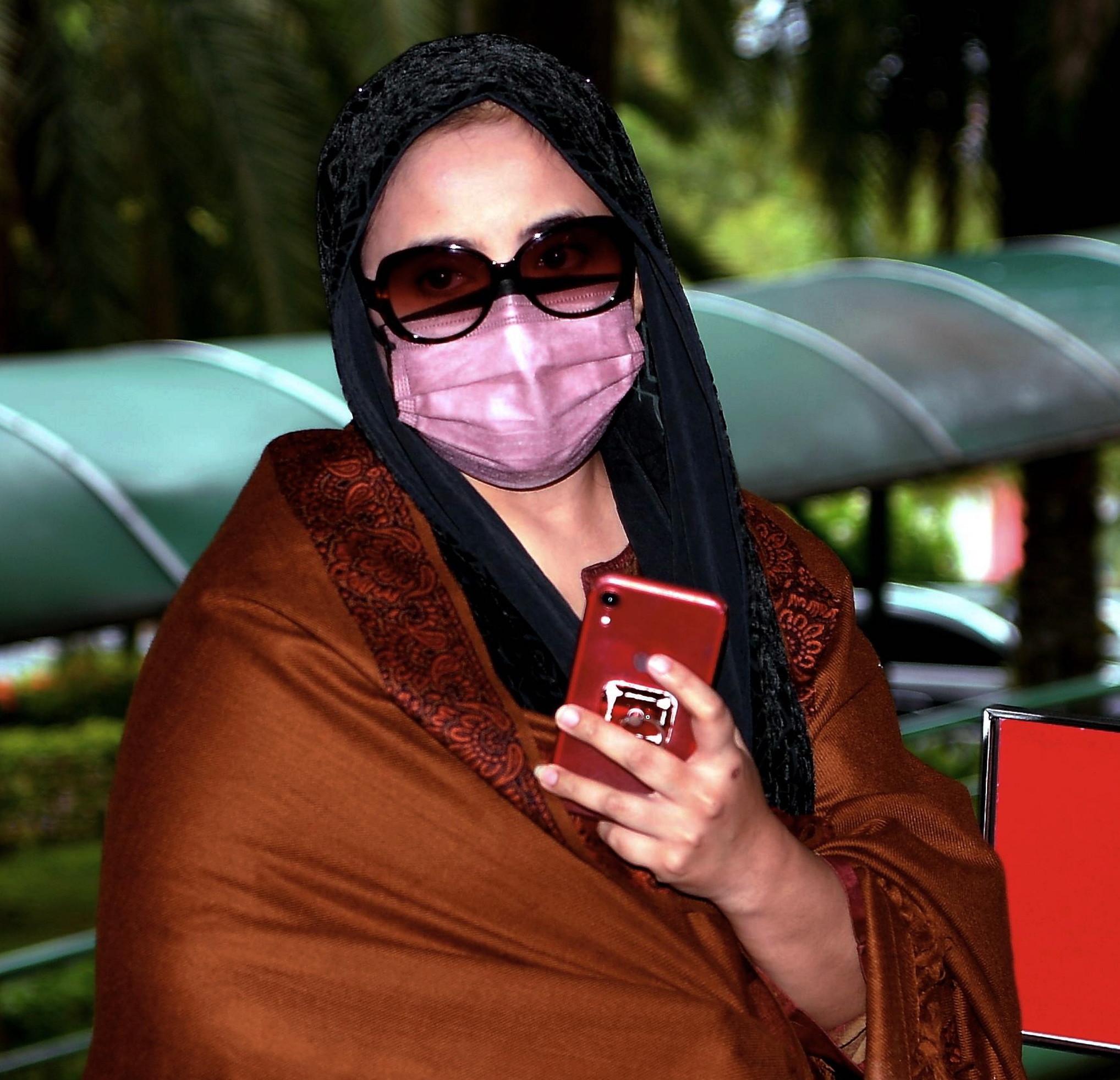 Samirah Muzaffar, the widow of Cradle Fund CEO Nazrin Hassan, arrives at the Shah Alam High Court today. Photo: Bernama